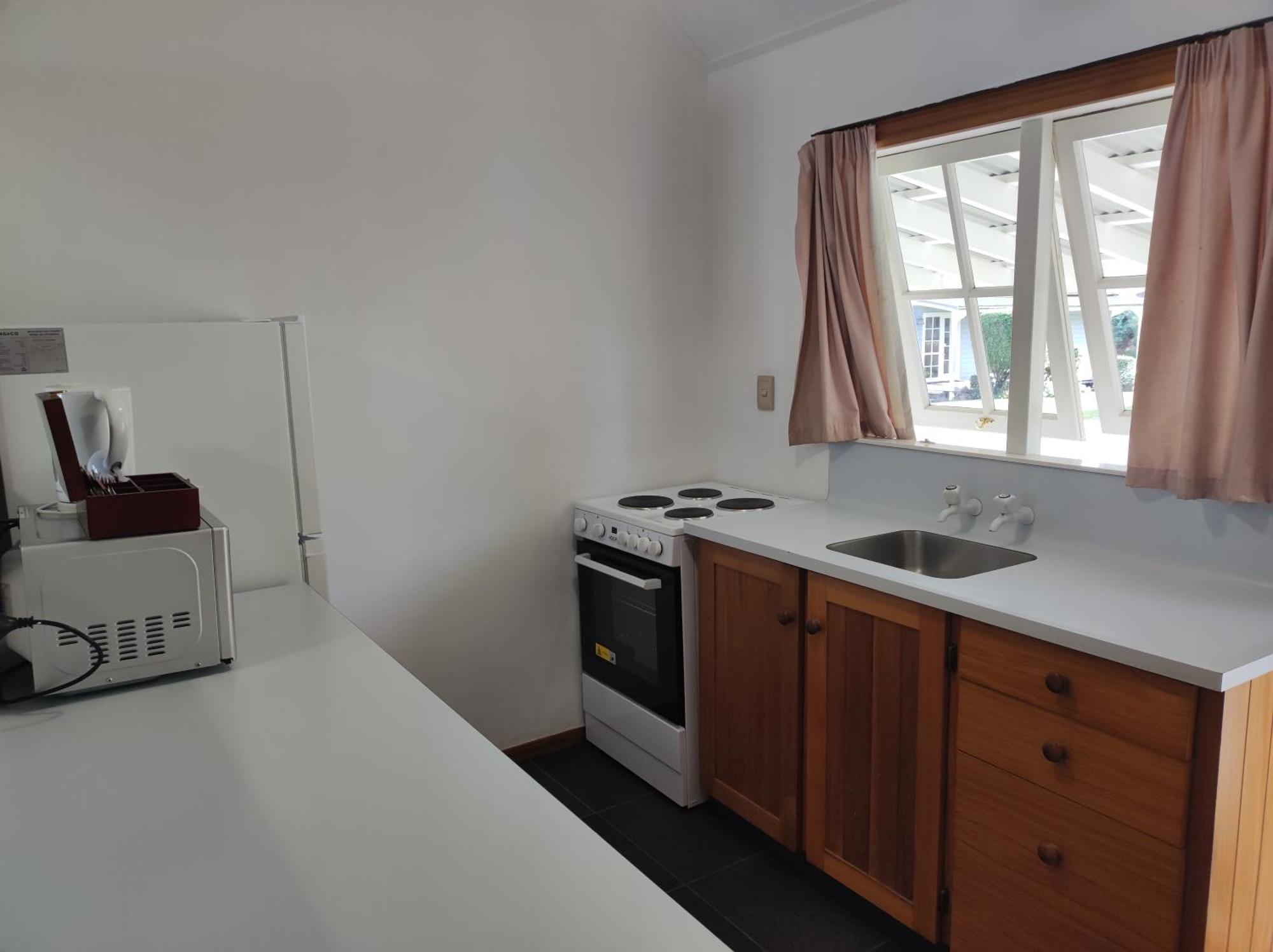 Huka Falls Resort Taupo Dış mekan fotoğraf A kitchen in a student flat